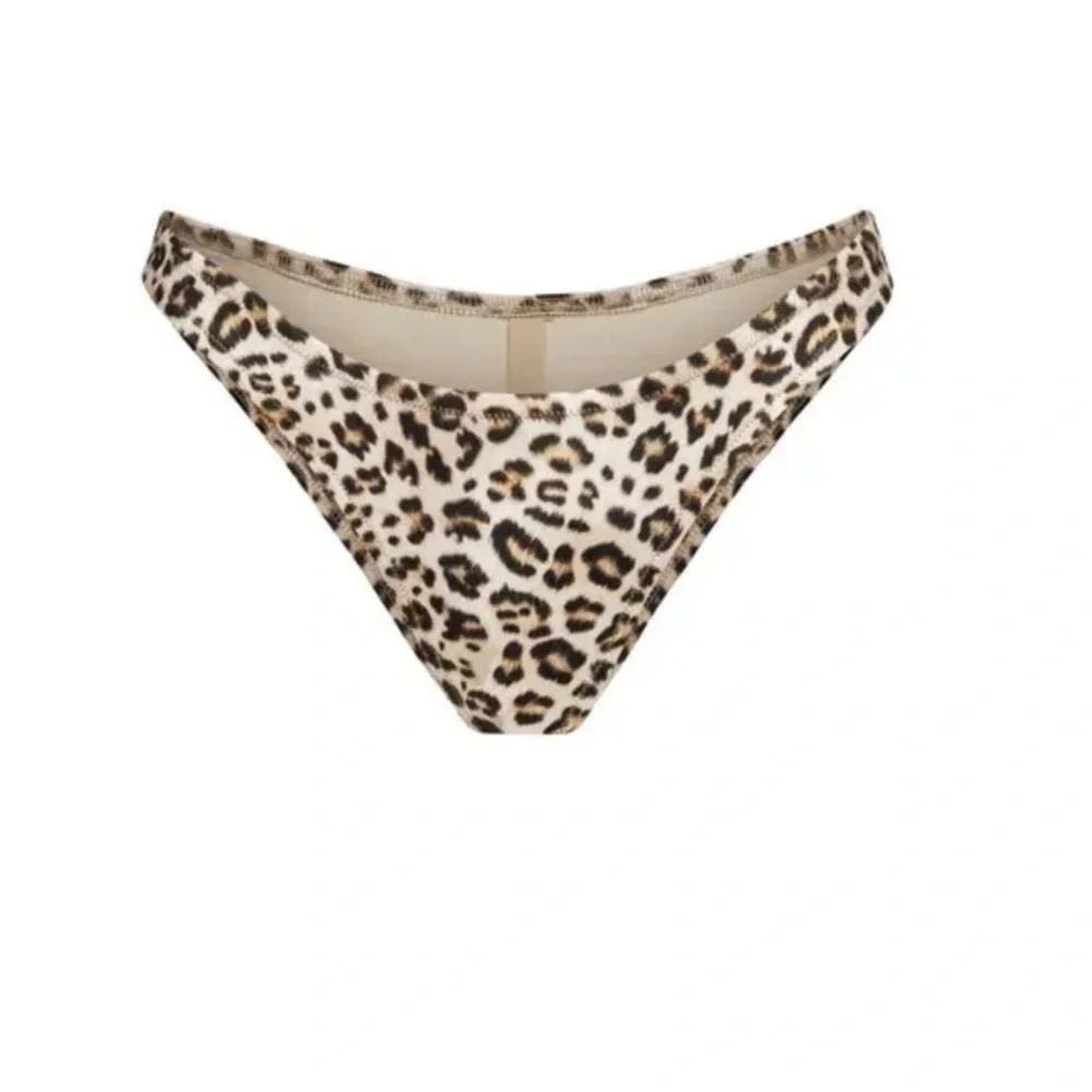 NEW SKIMS SWIM CHEEKY TANGA BIKINI BOTTOM CHAMPAGNE LEOPARD PRINT L